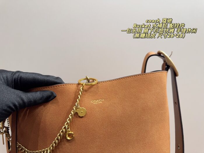 Coach Bucket Bag With Charm Accessory Versatile Bag Elegant Underarm Carry, Handheld Or Crossbody Genuine Cowhide Leather - Image 7