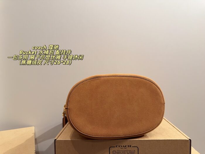 Coach Bucket Bag With Charm Accessory Versatile Bag Elegant Underarm Carry, Handheld Or Crossbody Genuine Cowhide Leather - Image 9