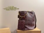 Coach Bucket Bag With Charm Accessory Versatile Bag Elegant Underarm Carry, Handheld Or Crossbody Genuine Cowhide Leather - Image 10
