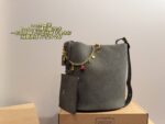 Coach Bucket Bag With Charm Accessory Versatile Bag Elegant Underarm Carry, Handheld Or Crossbody Genuine Cowhide Leather - Image 11