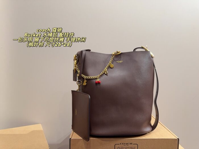 Coach Bucket Bag With Charm Accessory Versatile Bag Elegant Underarm Carry, Handheld Or Crossbody Genuine Cowhide Leather - Image 12
