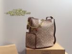 Coach Bucket Bag With Charm Accessory Versatile Bag Elegant Underarm Carry, Handheld Or Crossbody Genuine Cowhide Leather - Image 14