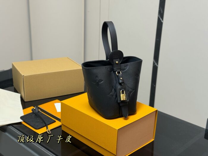 Louis Vuitton Vintage Bucket Bag Distinctive Design Lock-Shaped Decorative Detail - Image 1