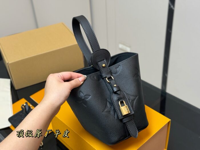 Louis Vuitton Vintage Bucket Bag Distinctive Design Lock-Shaped Decorative Detail - Image 2