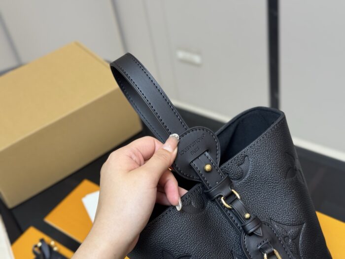 Louis Vuitton Vintage Bucket Bag Distinctive Design Lock-Shaped Decorative Detail - Image 3