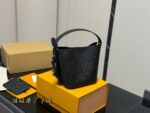 Louis Vuitton Vintage Bucket Bag Distinctive Design Lock-Shaped Decorative Detail - Image 5