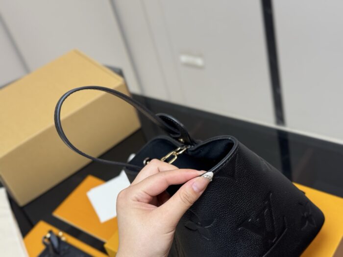 Louis Vuitton Vintage Bucket Bag Distinctive Design Lock-Shaped Decorative Detail - Image 7