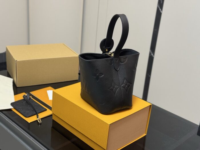 Louis Vuitton Vintage Bucket Bag Distinctive Design Lock-Shaped Decorative Detail - Image 8