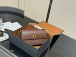 Coach Juno Crossbody Bag Triple-Function Structured Silhouette Generous Capacity Minimalist, Timeless Design