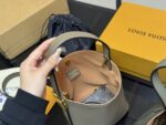 Louis Vuitton Vintage Bucket Bag With Lock Design – Distinctive And Unconventional - Image 4