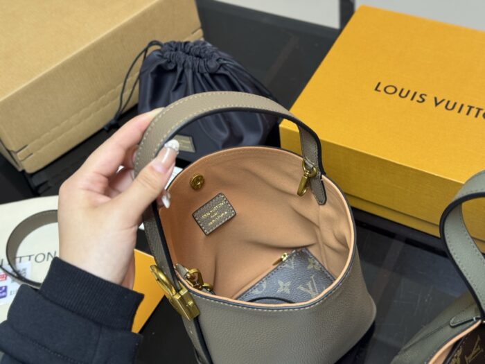 Louis Vuitton Vintage Bucket Bag With Lock Design – Distinctive And Unconventional - Image 4