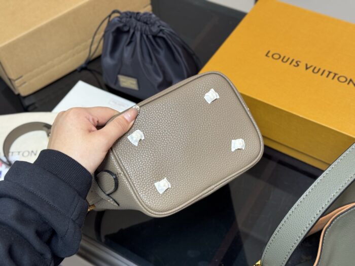 Louis Vuitton Vintage Bucket Bag With Lock Design – Distinctive And Unconventional - Image 8