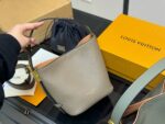 Louis Vuitton Vintage Bucket Bag With Lock Design – Distinctive And Unconventional - Image 9