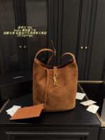 Yves Saint Laurent Suede Hobo Underarm Bag: Refined, Sophisticated, Vintage-Inspired, Lightweight.