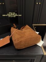 Yves Saint Laurent Suede Hobo Underarm Bag: Refined, Sophisticated, Vintage-Inspired, Lightweight. - Image 7