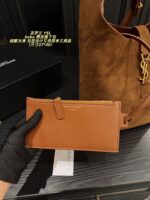 Yves Saint Laurent Suede Hobo Underarm Bag: Refined, Sophisticated, Vintage-Inspired, Lightweight. - Image 8