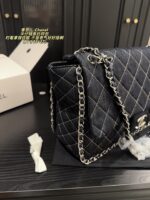 Chanel Denim Chain Tote Bag Stylish, Versatile, And Exuding Elegance - Image 4