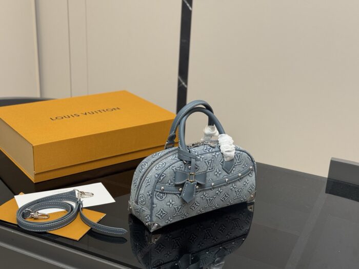 Louis Vuitton Keepall Denim Blue Pillow Bag With Riveted Bow Design - Image 1
