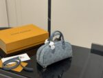 Louis Vuitton Keepall Denim Blue Pillow Bag With Riveted Bow Design - Image 8