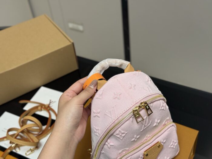 Louis Vuitton Denim Mini Backpack Pink Versatile Carry Option Adorable And Practical Little Bag - Image 3