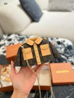 Louis Vuitton Mini Clothes Crossbody Bag: Compact, Practical, Versatile And Stylish. - Image 2