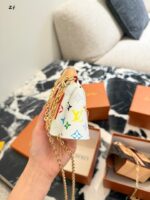 Louis Vuitton Mini Clothes Crossbody Bag: Compact, Practical, Versatile And Stylish. - Image 8