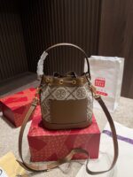 Tory Burch Monogram Denim Bucket Bag Distressed Wash Denim Vintage Look Generous Capacity - Image 3