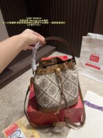 Tory Burch Monogram Denim Bucket Bag Distressed Wash Denim Vintage Look Generous Capacity - Image 4