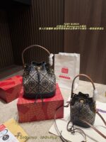 Tory Burch Monogram Denim Bucket Bag Distressed Wash Denim Vintage Look Generous Capacity - Image 10