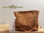 Yves Saint Laurent Suede Chain Bucket Bag Retro Elegance Impressive Capacity Effortlessly Versatile For Both Casual And Formal Occasions - Image 2