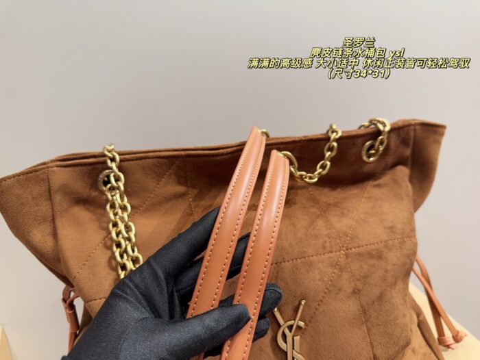 Yves Saint Laurent Suede Chain Bucket Bag Retro Elegance Impressive Capacity Effortlessly Versatile For Both Casual And Formal Occasions - Image 6