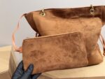 Yves Saint Laurent Suede Chain Bucket Bag Retro Elegance Impressive Capacity Effortlessly Versatile For Both Casual And Formal Occasions - Image 9