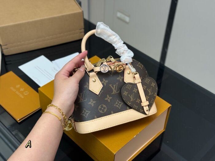 Louis Vuitton Nano Alam Shell Bag Handheld Or Crossbody Versatile And Elegant Perfect For Summer - Image 2