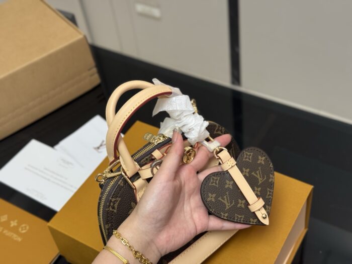 Louis Vuitton Nano Alam Shell Bag Handheld Or Crossbody Versatile And Elegant Perfect For Summer - Image 3