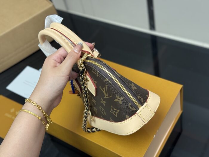 Louis Vuitton Nano Alam Shell Bag Handheld Or Crossbody Versatile And Elegant Perfect For Summer - Image 5