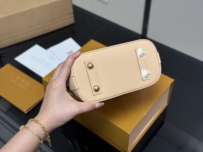 Louis Vuitton Nano Alam Shell Bag Handheld Or Crossbody Versatile And Elegant Perfect For Summer - Image 7