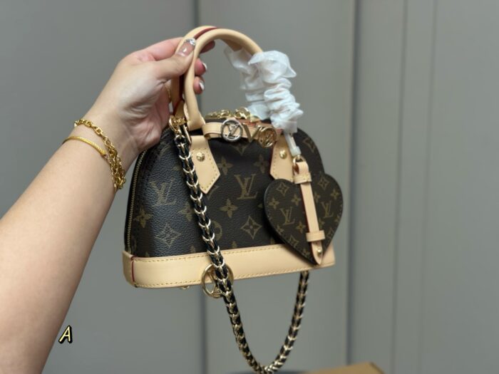 Louis Vuitton Nano Alam Shell Bag Handheld Or Crossbody Versatile And Elegant Perfect For Summer - Image 8