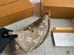 Louis Vuitton Vintage Horn Bag Vintage Classic Shoulder Bag With Shoulder Strap And Chain Versatile For Both Shoulder And Crossbody Carry - Image 2