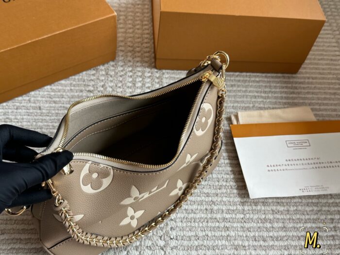 Louis Vuitton Vintage Horn Bag Vintage Classic Shoulder Bag With Shoulder Strap And Chain Versatile For Both Shoulder And Crossbody Carry - Image 8